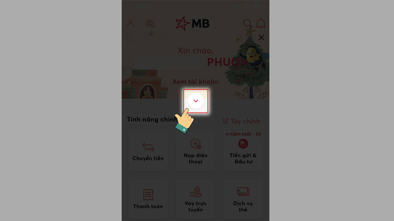 Bước 1: Đăng nhập ứng dụng MB Bank và chọn mũi tên xuống