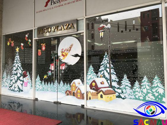 Mẫu decal dán kính trang trí Giáng Sinh với hình ảnh ông già Noel, tuần lộc và thông điệp "Merry Christmas"