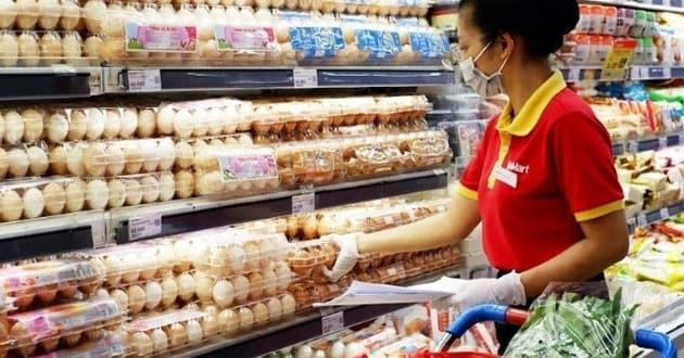 Biển hiệu Winmart+ với giờ mở cửa 24/7