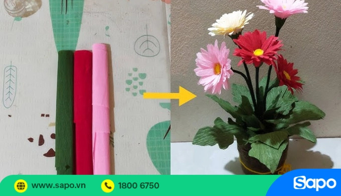Những bông hoa đồng tiền màu tím rực rỡ được làm từ giấy nhún, trông tự nhiên và sinh động